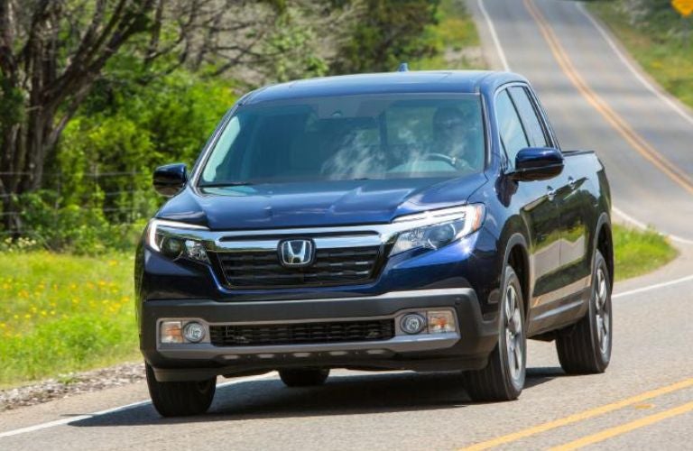 A 2019 Honda Ridgeline speeding on a road