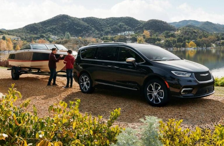 2023 Chrysler Pacifica towing a boat