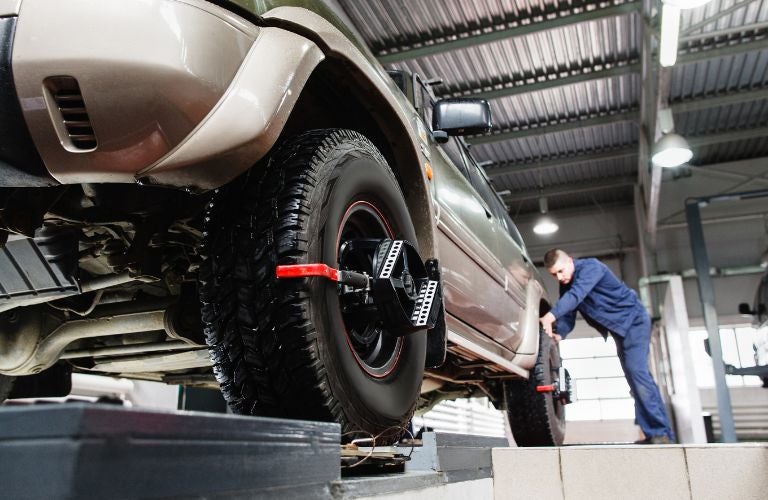 Technician checking a vehicle