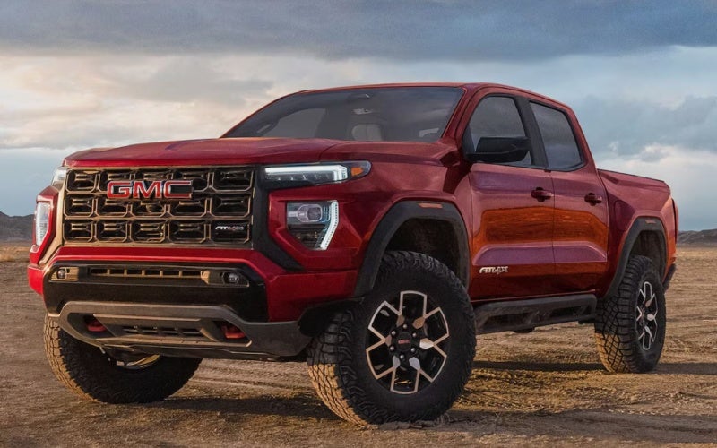 Does the 2026 GMC Canyon tow and handle mountain drives better than the Nissan Frontier near Pueblo, CO?