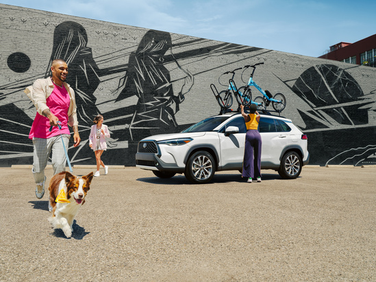 White Toyota model with bikes