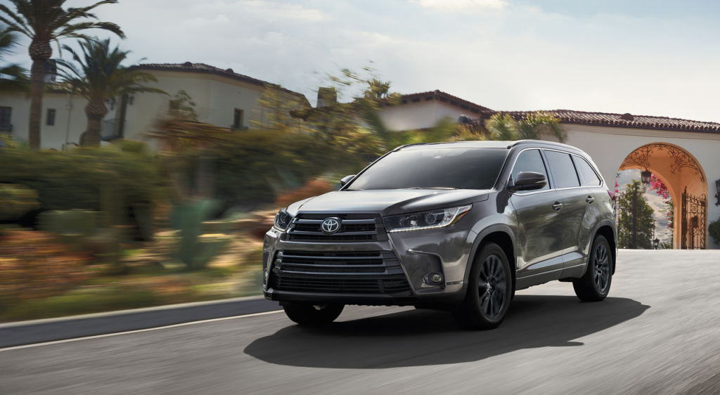 2019 Dark Gray Toyota Highlander driving