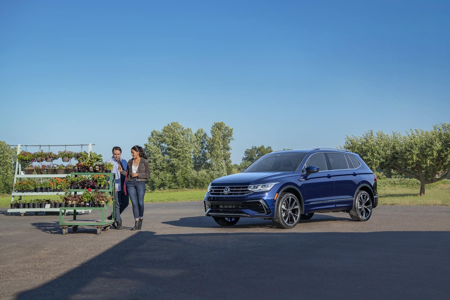 First-time car buyer reviewing options at LaFontaine Volkswagen Dearborn