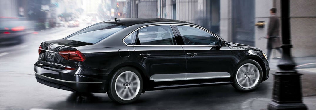 Volkswagen Passat driving on a road