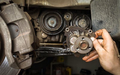 This image has an empty alt attribute; its file name is Jaguar-Water-Pump-Replacement.jpg