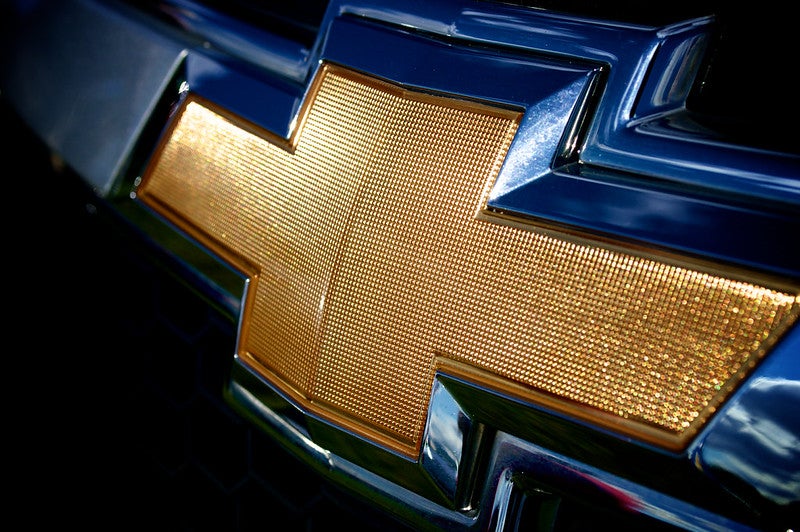 Chevy logo on a blue chevrolet vehicle