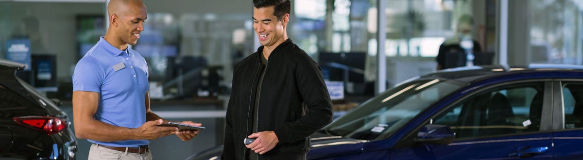 Hyundai Service Advisor Helping Customer