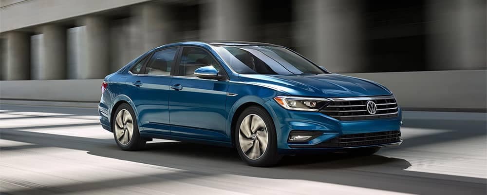2019-Volkswagen-Jetta-Blue-Driving
