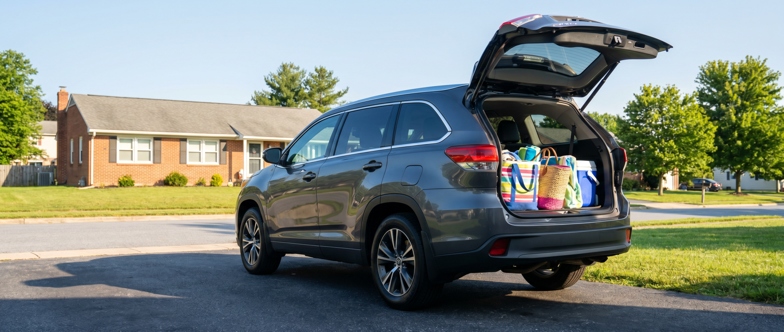 Used Toyota Highlander with packed cargo area for a family road trip in Hampstead MD