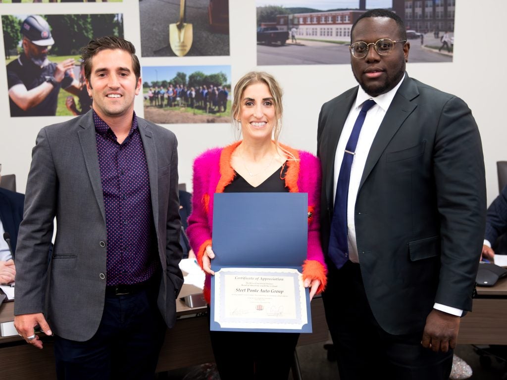 Joe Steet Jr. and Carly Steet Mathias receiving a certificate from the Utica City School District for the Annual Coats for Kids Coat Drive 2024!