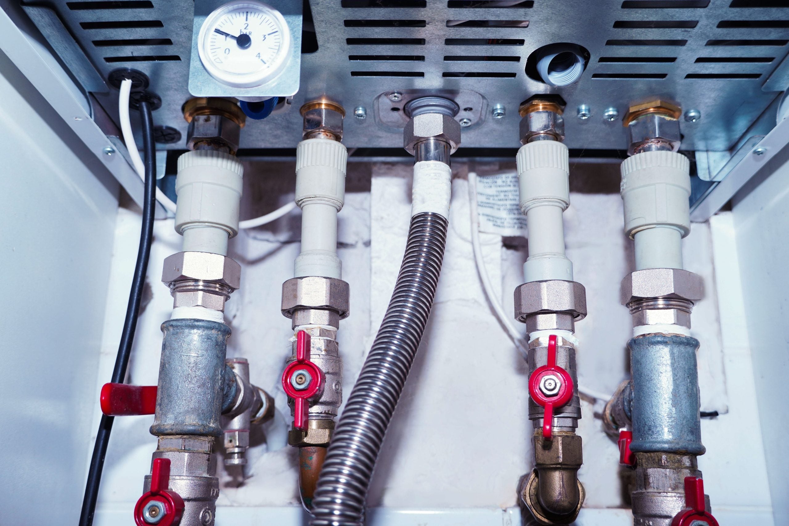 Plumbing,Connections,Of,A,Modern,Domestic,Double-circuit,Gas,Boiler,,Water