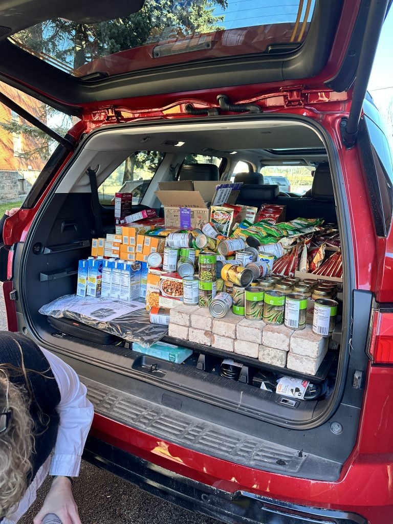 Toyota Sequoia full of non-perishable items at the Thea Bowman House in Utica, NY from the Steet Ponte Auto Group and United Auto Sales