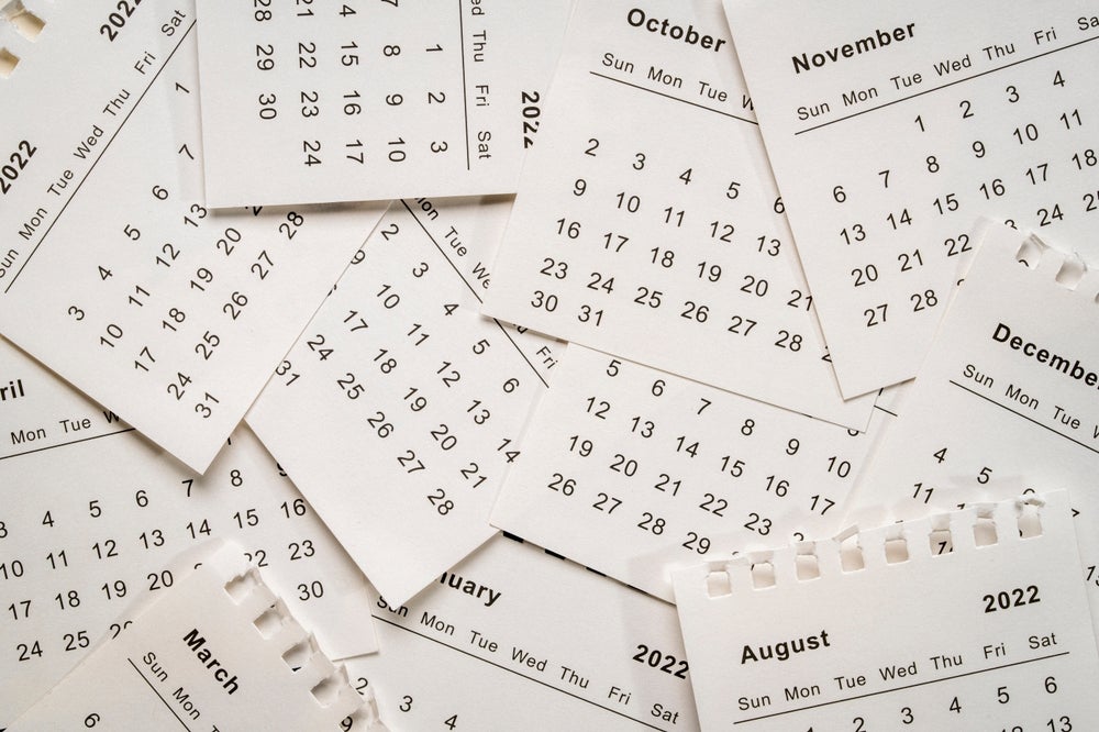 calendars overlapping each other, containing different months.
