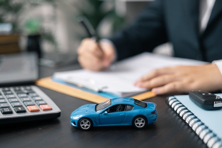car-next-to-calculator