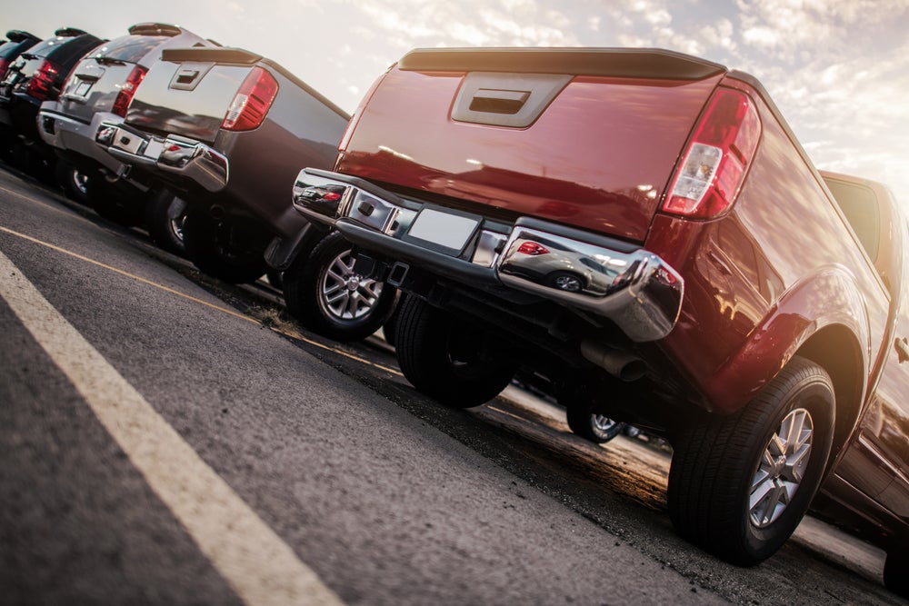 Line,Of,Parked,Modern,Cars.,Pickup,Trucks,And,Suv,Sport