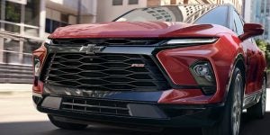 A fierce 2025 Chevy Blazer driving through the city streets.