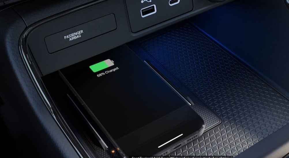 A cellphone charging in a 2026 Honda CR-V.