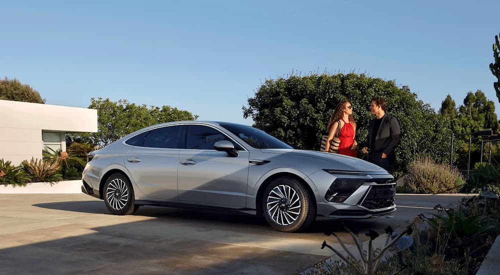 Grey 2025 Hyundai Sonata parked in a driveway.