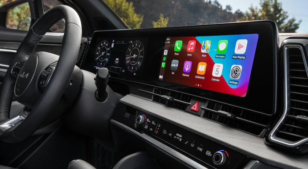 A close-up on the dashboard screen in the interior of a 2025 Kia Sportage X-Pro.