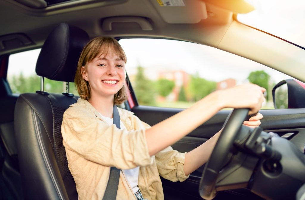 a girl driving car