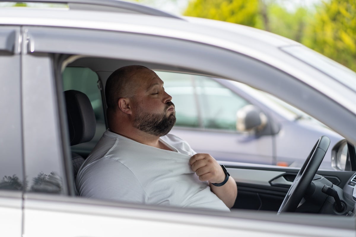 Exhausted,Man,Driver,Feeling,Blood,Pressure,Sitting,Inside,Car,Hot