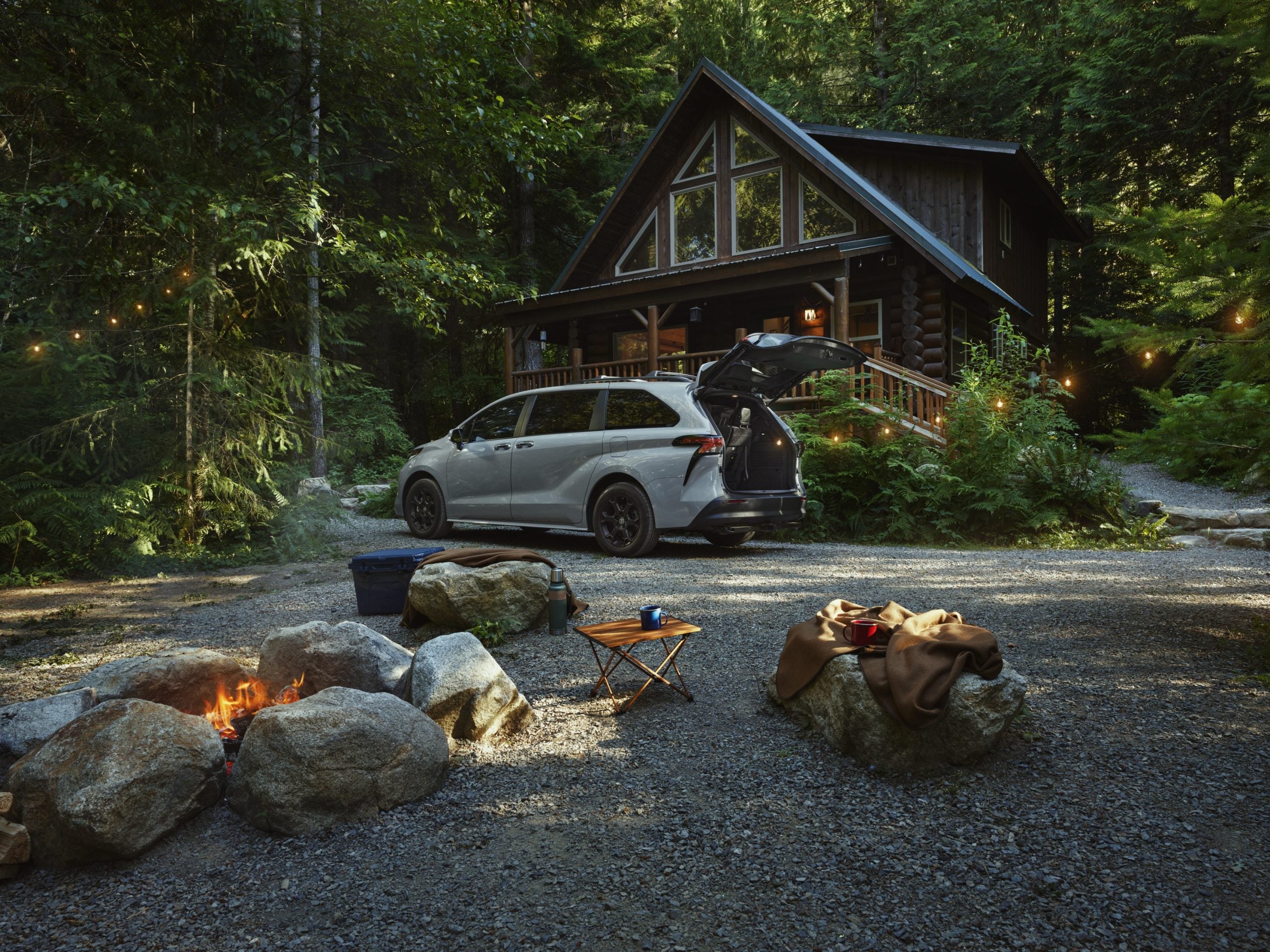 2026 Toyota Sienna outside a cabin in the woods