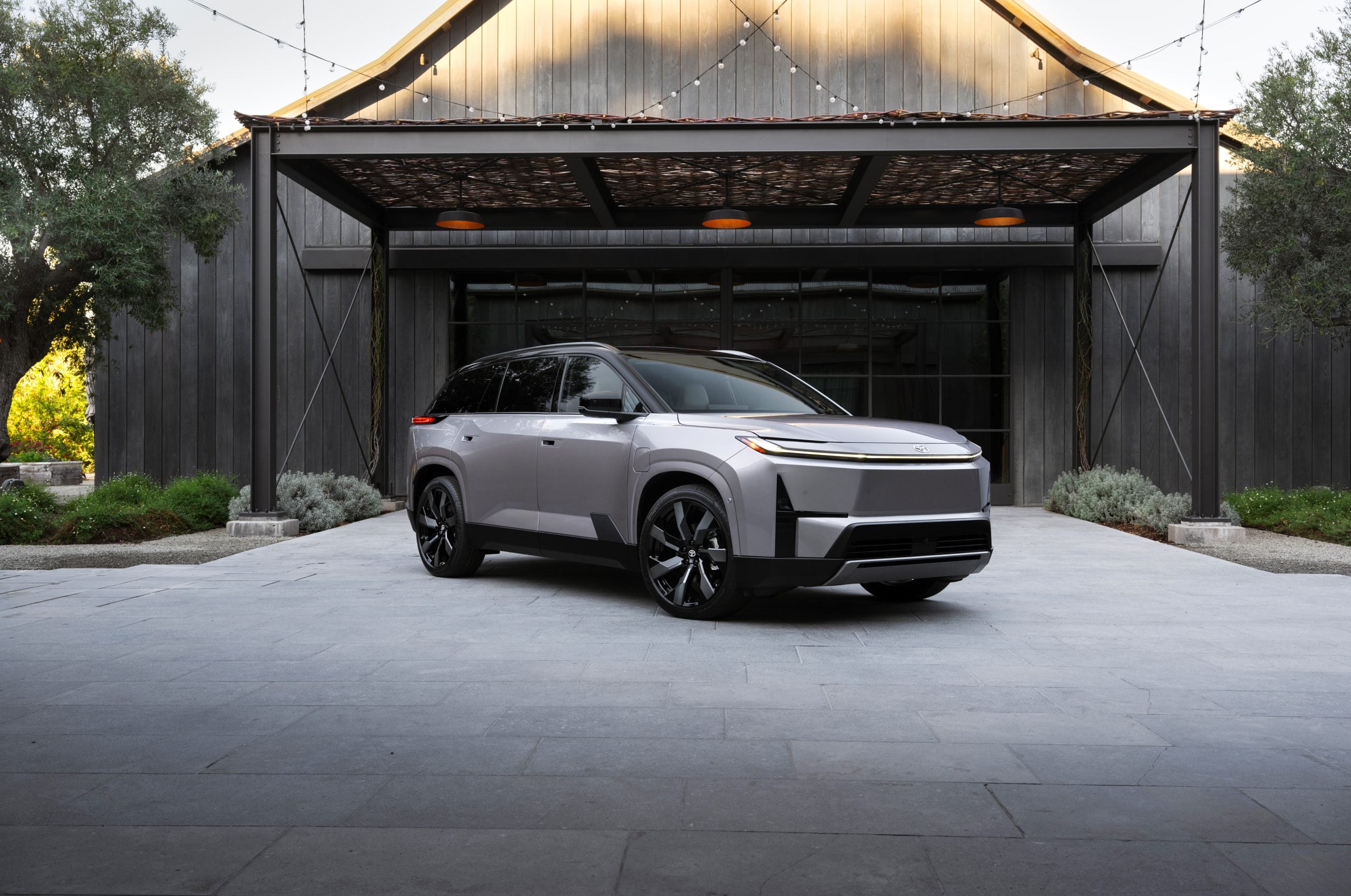 2026 Toyota Highlander in front of house
