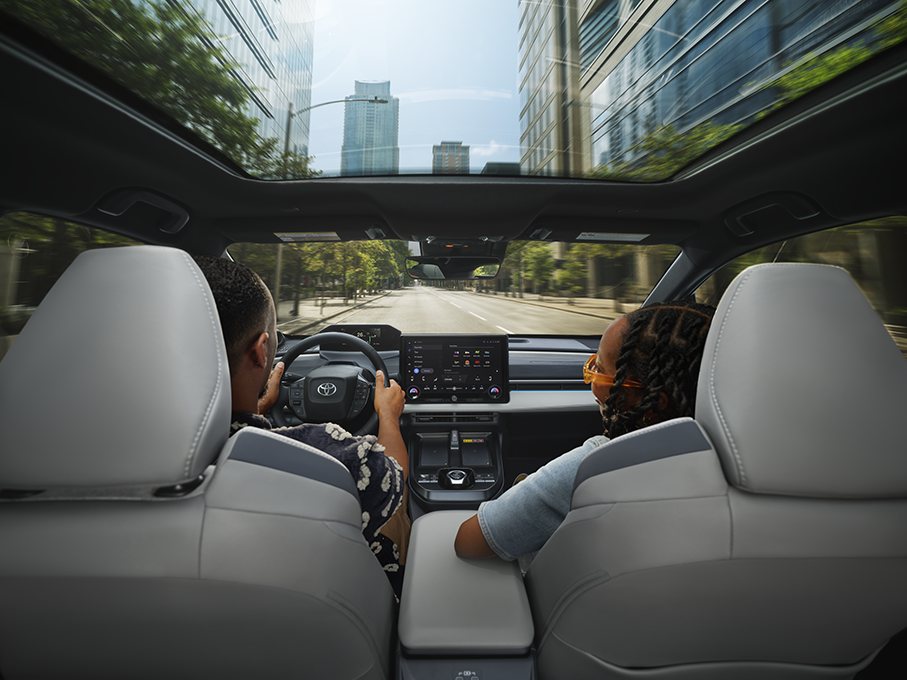 Toyota panoramic roof driving through the city