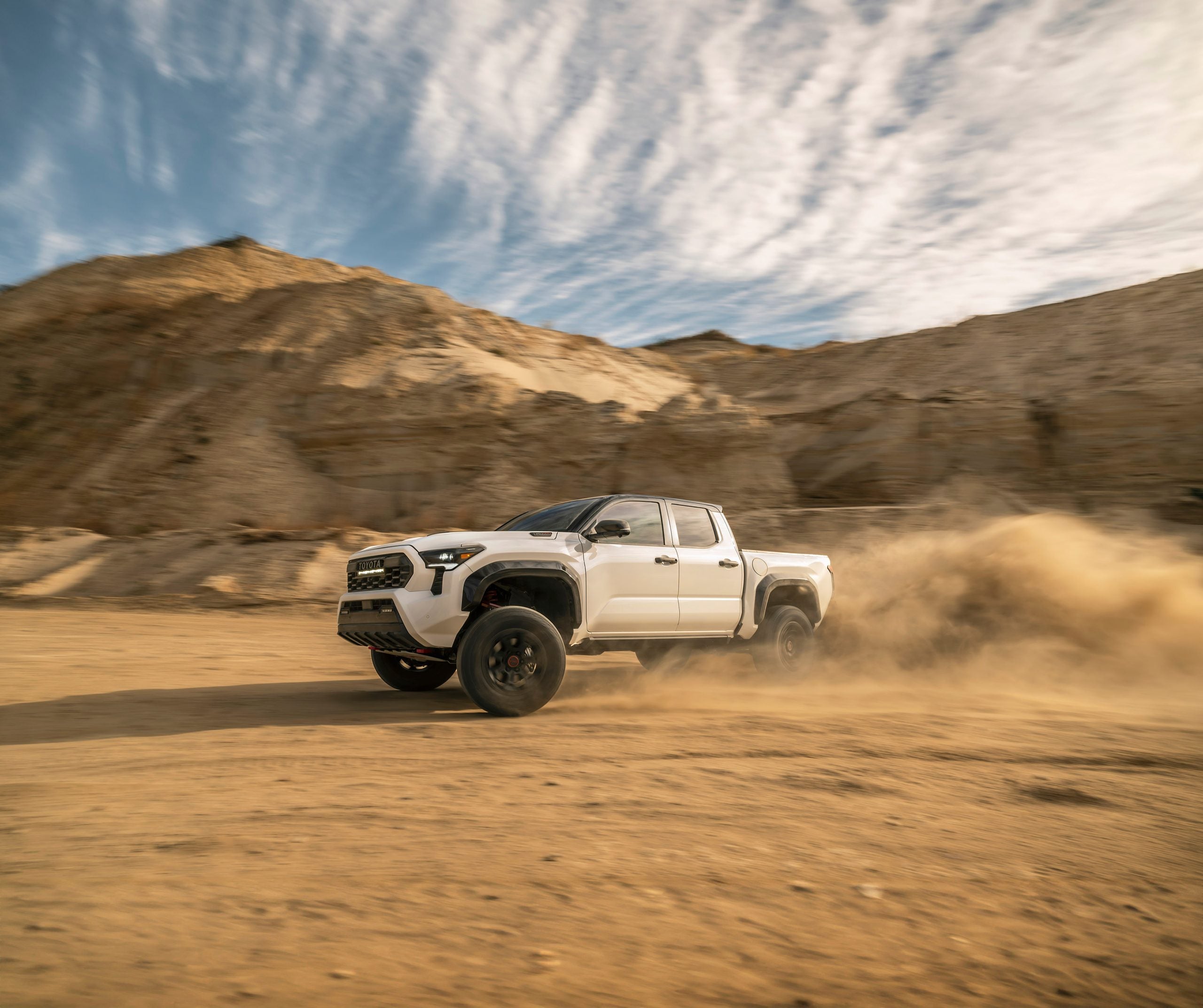 2026 Toyota Tacoma in white off-roading