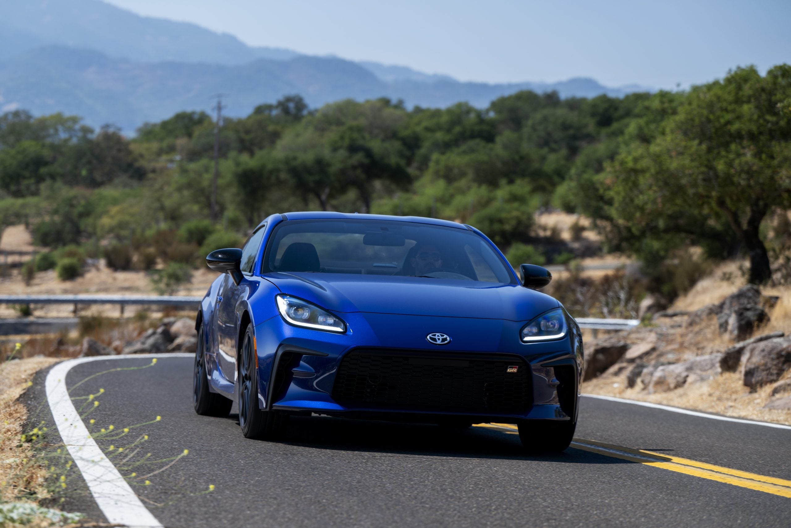 2027 Toyota GR86 driving on road