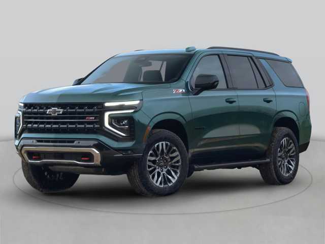 A dark green Chevrolet Tahoe