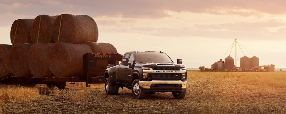 Chevy Silverado 2500 towing hay bales