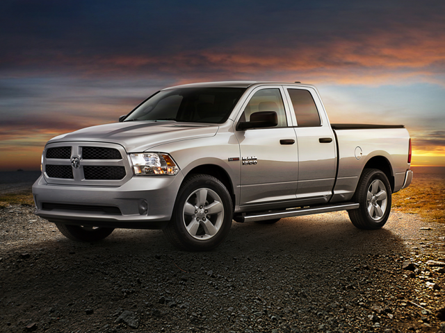 Side view of a silver 2017 Ram 1500 Tradesman diesel