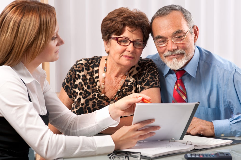 Senior,Couple,Meeting,With,Agent,Or,Advisor