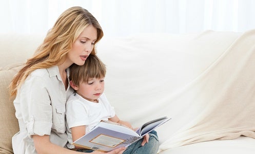 Mother reading with her son