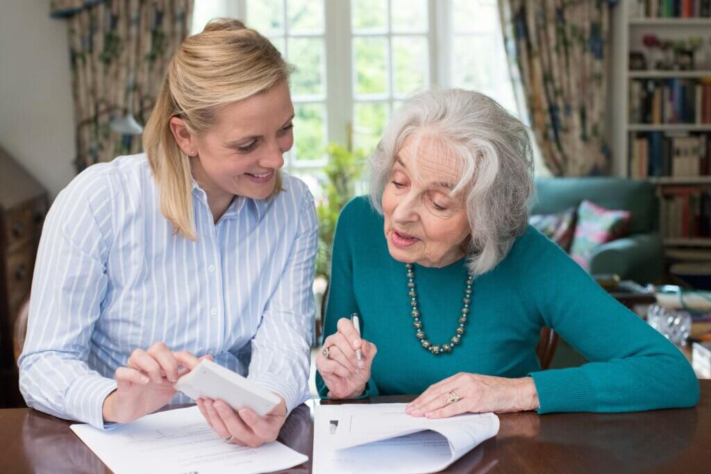 woman-helping-senior-power-of-attorney-1024x683
