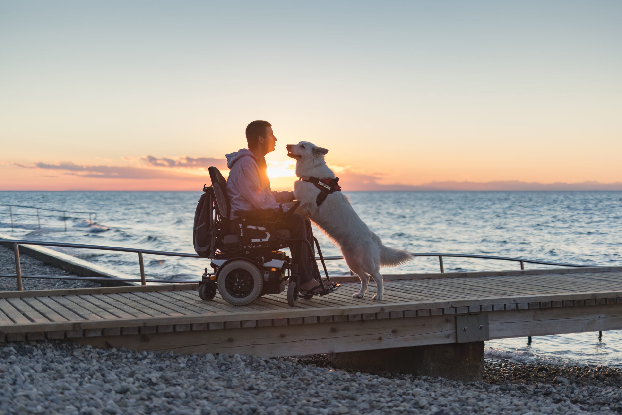 Man with disability with his service dog