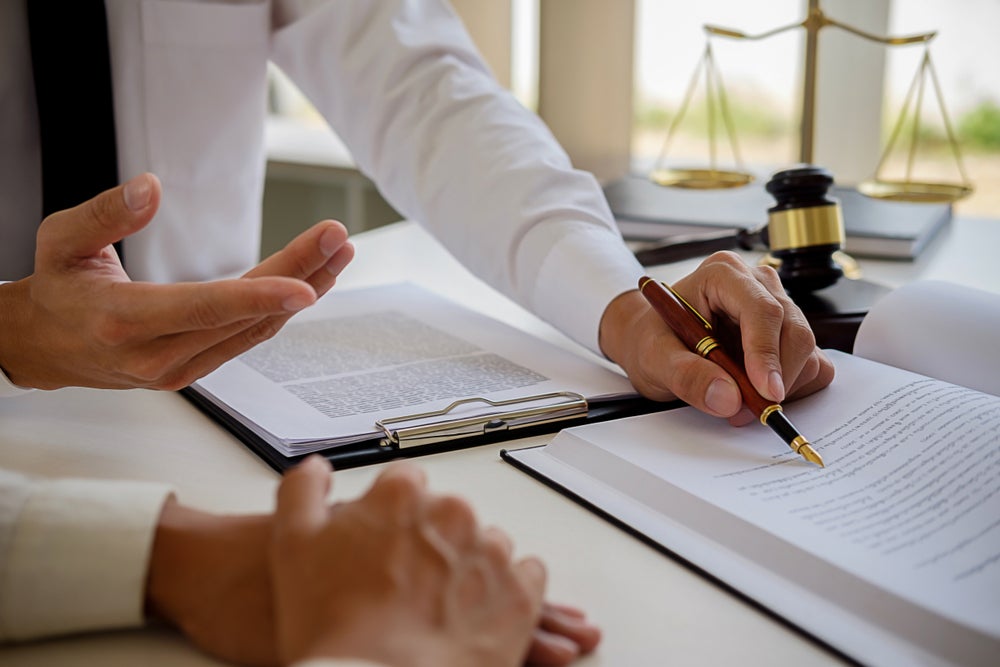 man going over a legal document