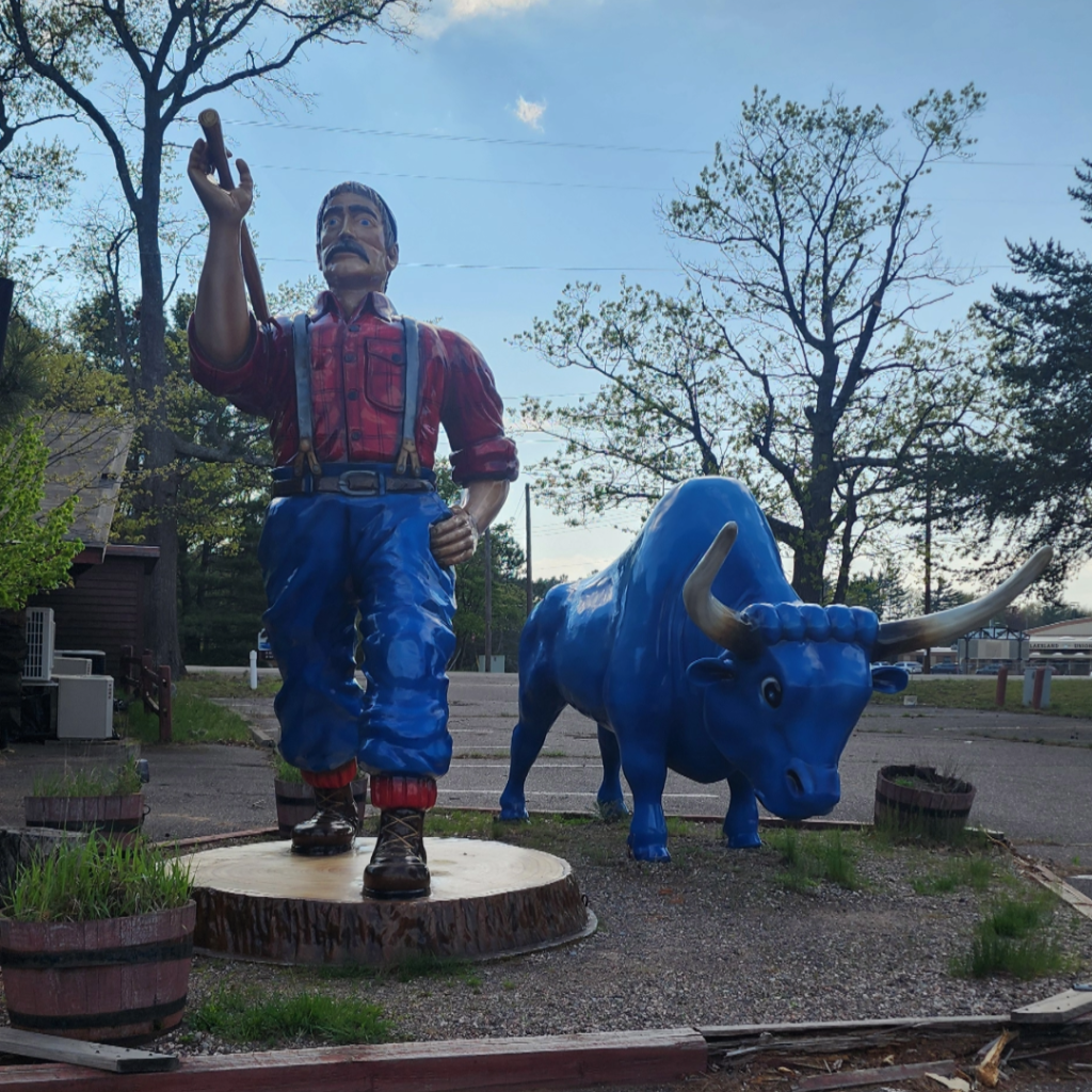 paul bunyan statue with babe the blue ox statue