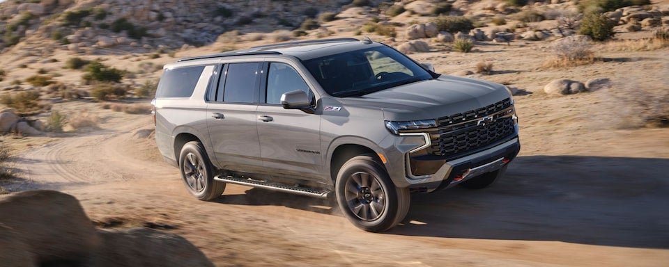 The Sterling Grey Metallic Suburban Driving on a Desert Off-Road