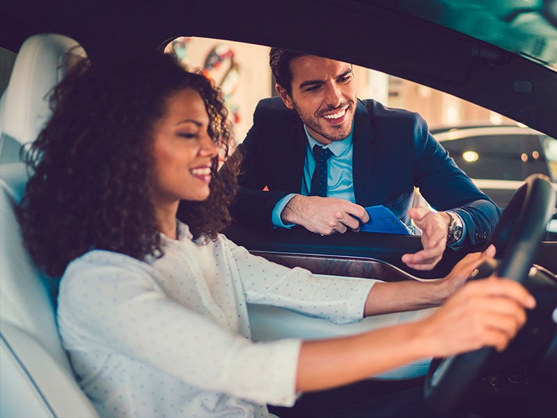 Woman behind the steering wheel