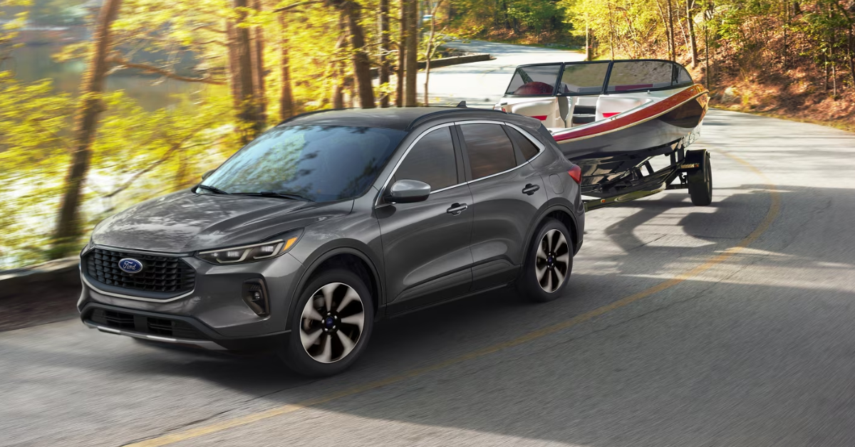 2025 Ford Escape towing a small boat