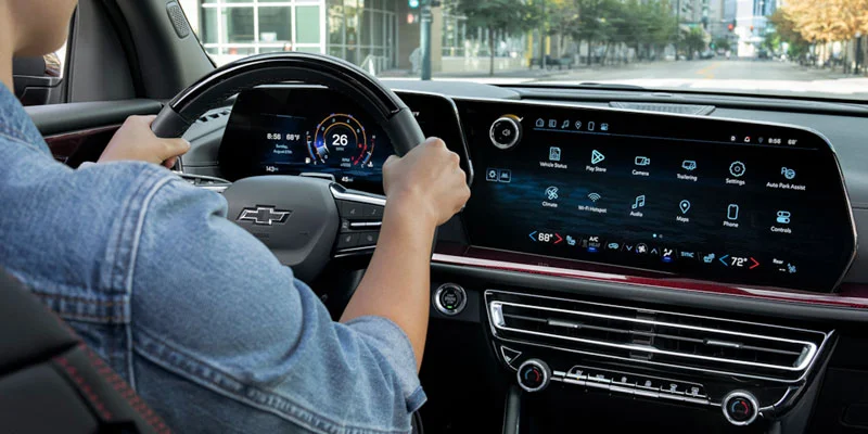 A person test driving a 2025 Chevrolet Traverse near Fort Gratiot, MI