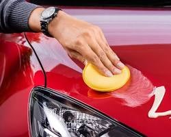 Image of Waxing a car