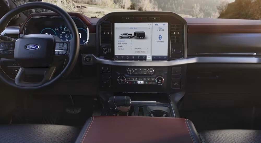 A close up shows the infotainment screen in 2023 Ford F-150.