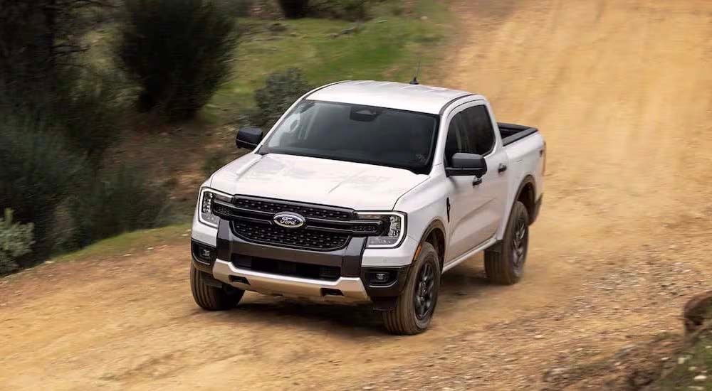 A white 2023 Ford Ranger XLT is shown from the front at an angle.