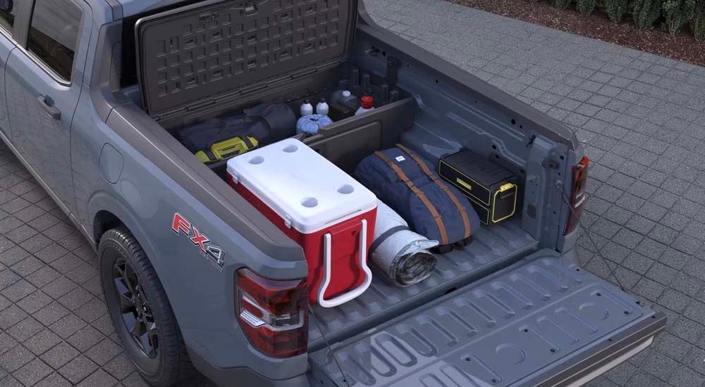 Overhead view of a grey 2025 Ford Maverick with the Flexbed open.