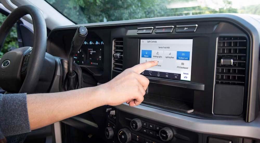 A close-up of the infotainment screen in a 2024 Ford F-350 Super Duty is shown.