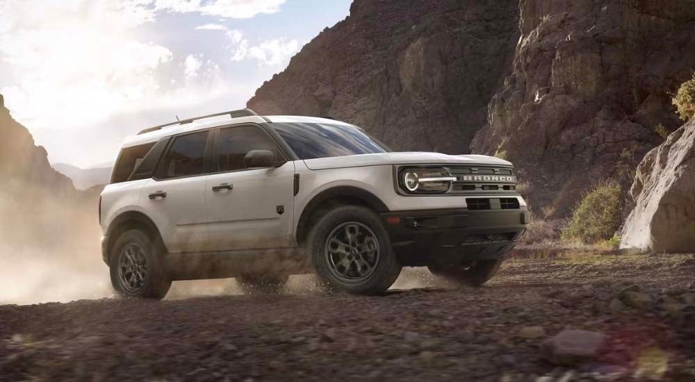 Ford%20Dealer%20Near%20Morganfield%20-%202024%20Ford%20Bronco%20Sport%20Big%20Bend%20-%20White%202.jpg A white 2024 Ford Bronco Sport Big Bend is shown off-roading.