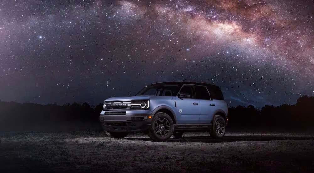 A blue 2024 Ford Bronco Sport is shown from the front at an angle.